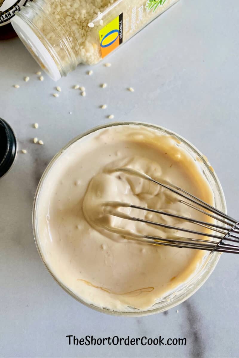 dipping sauce with whisk in the bowl