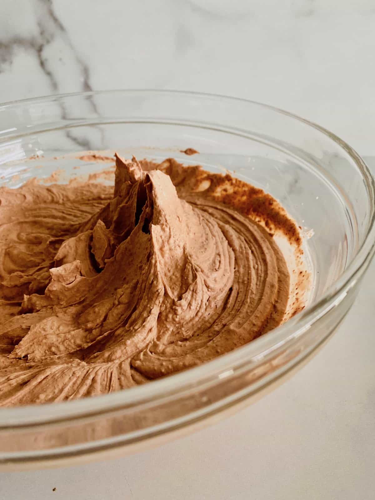 stiff peaks of mousse in the bowl