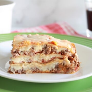 Place lasagna with layers of cheese meat sauce and Crepini egg wraps