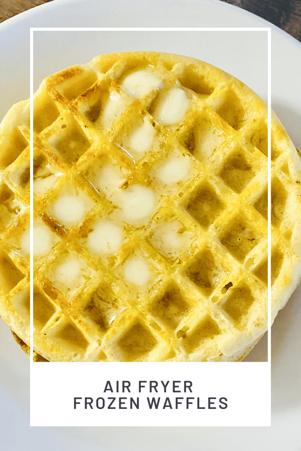 stacked waffles with butter plated and ready to eat