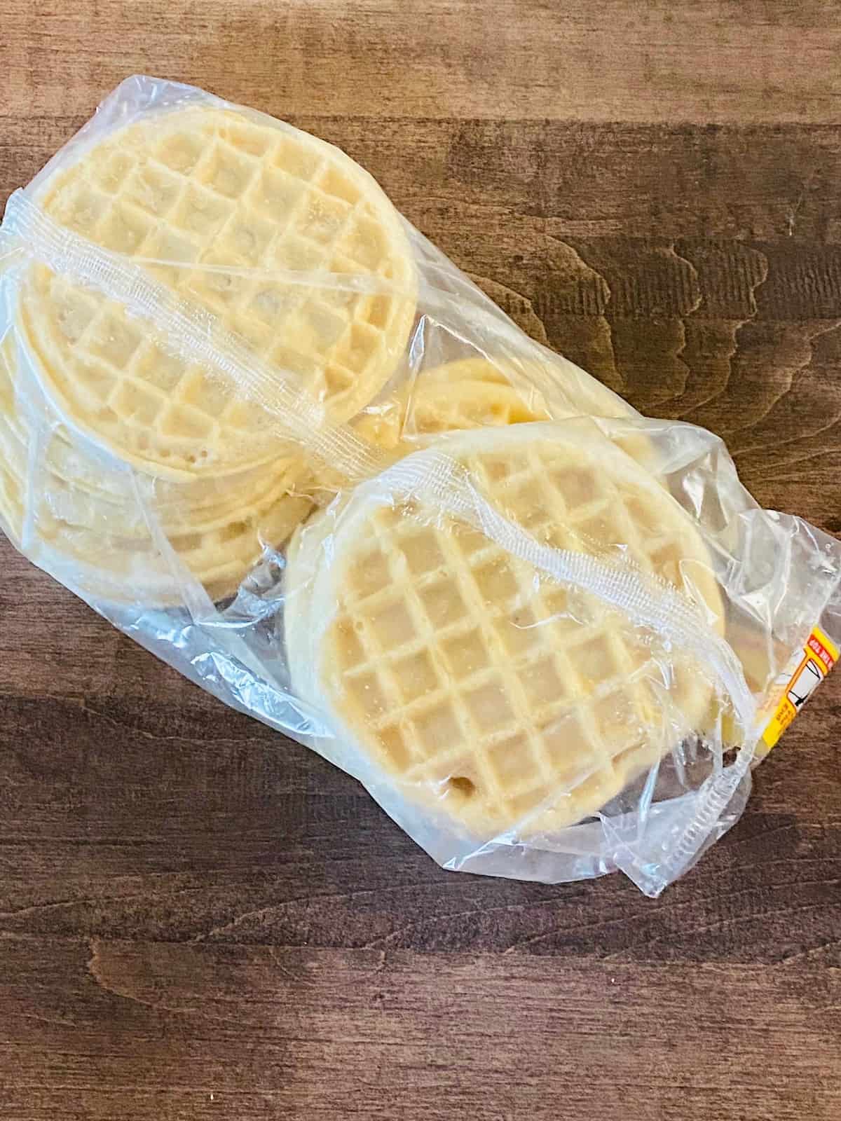 package of waffles sitting on the table ready to cook