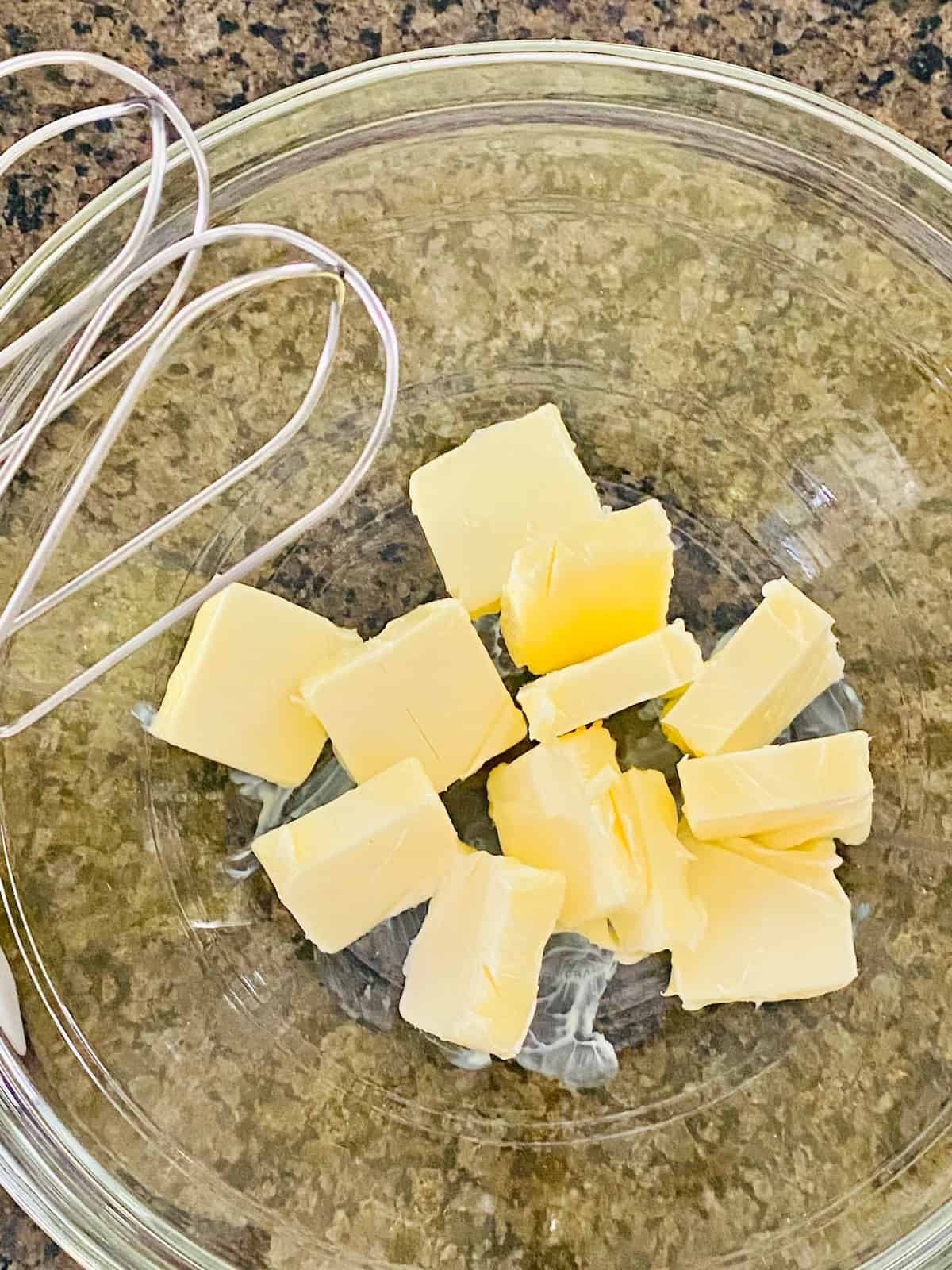 Cut butter in a mixing bowl.