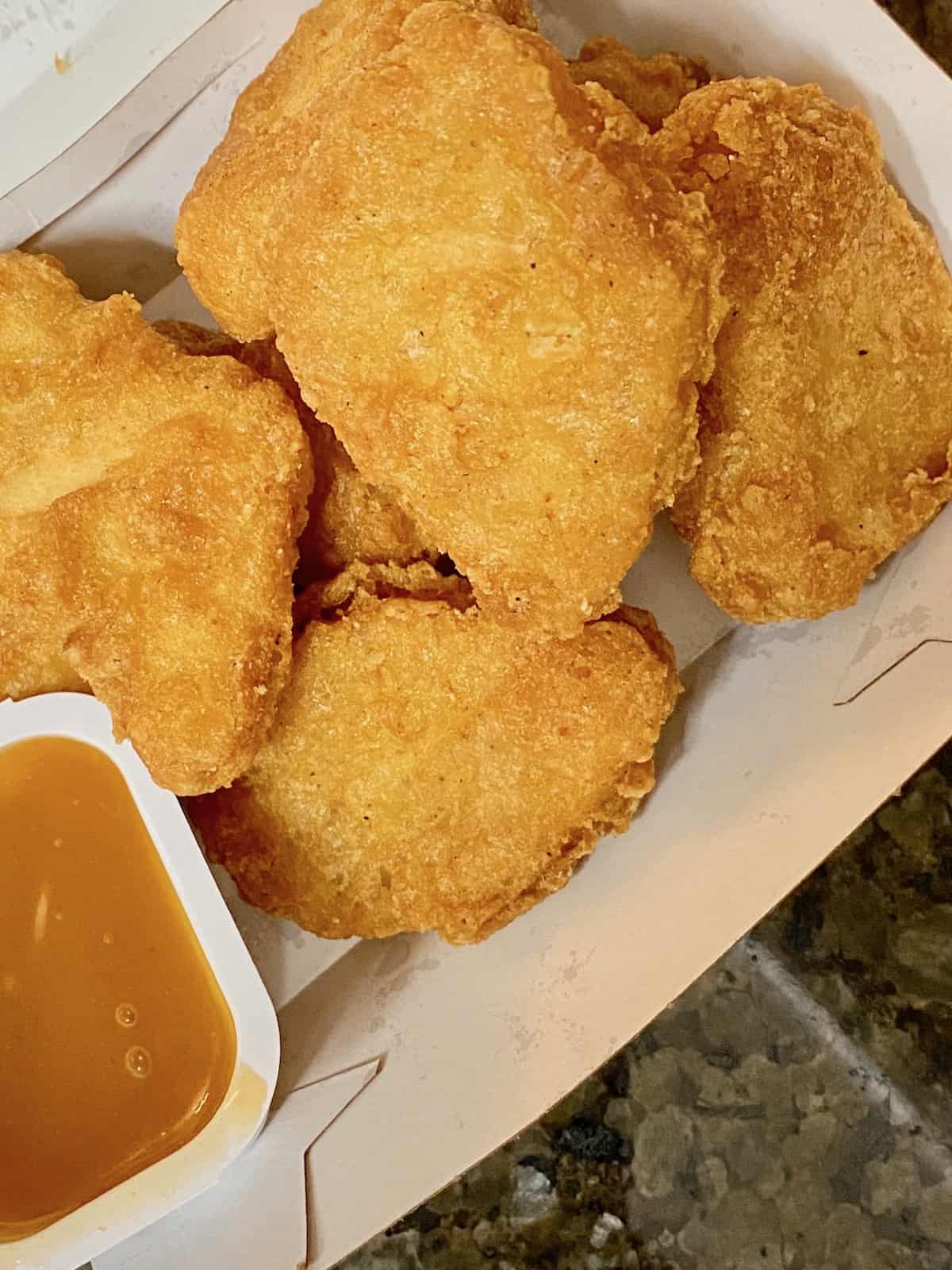 Closeup of hot nuggets in the box.
