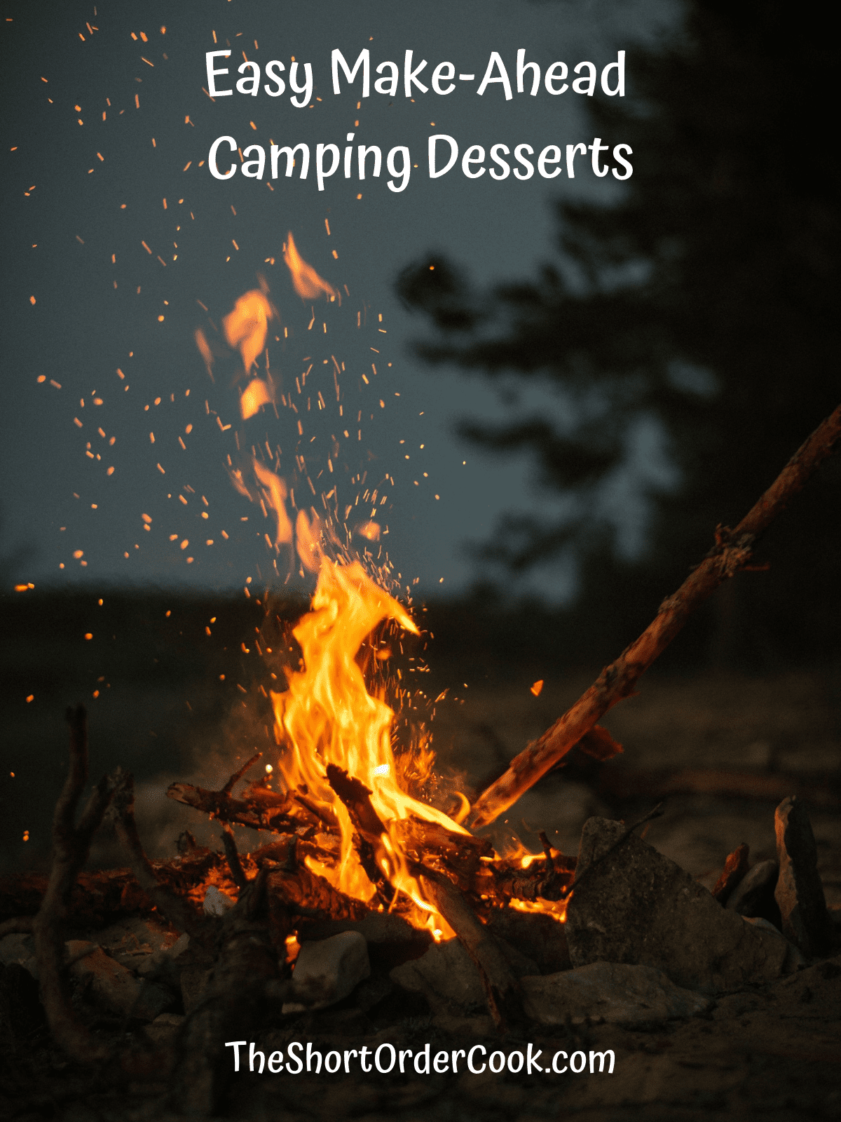 A campfire roaring at night.