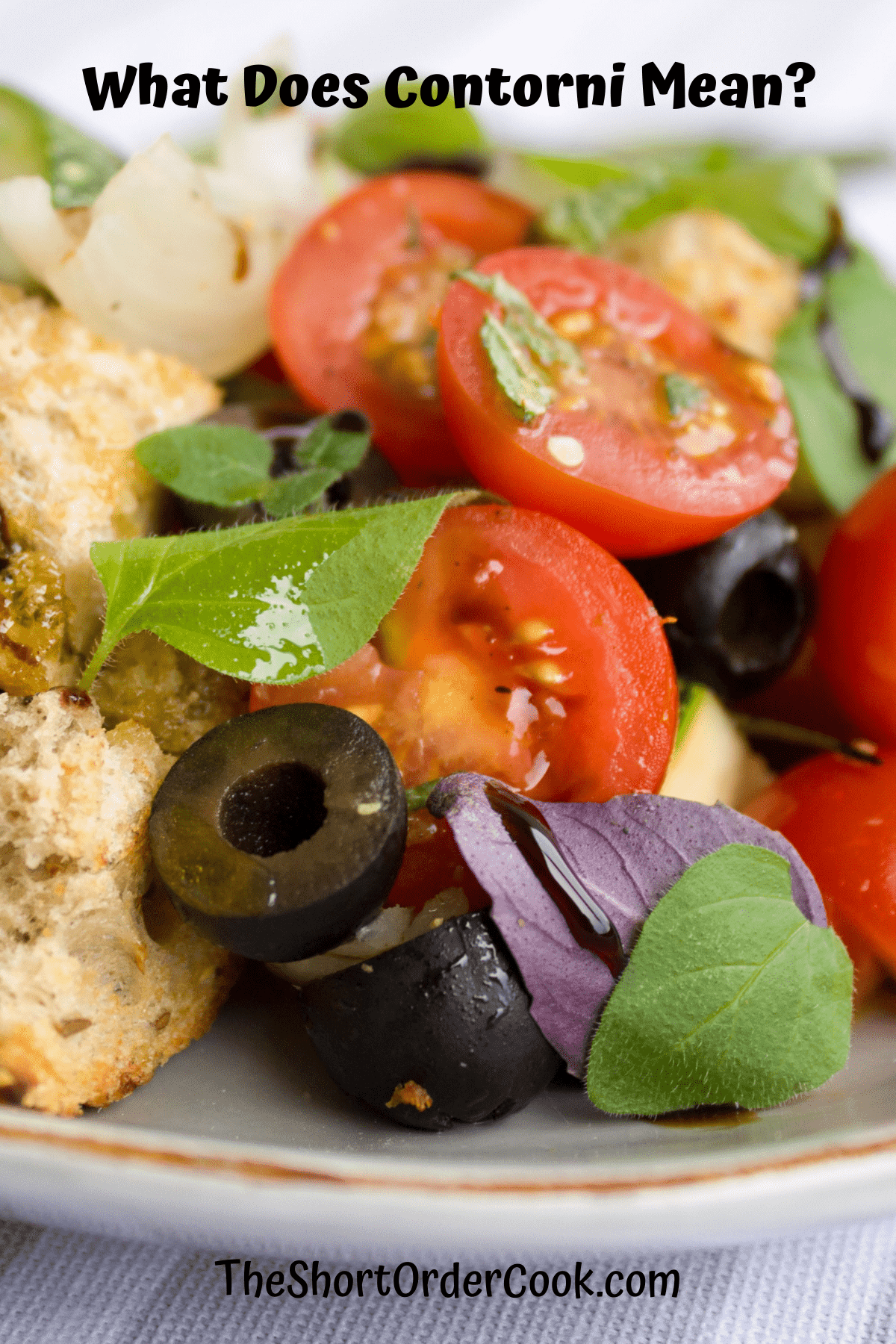 Plated tomato and olive salad. 