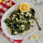 Platter of air fryer broccolini with lemon and parmesan.