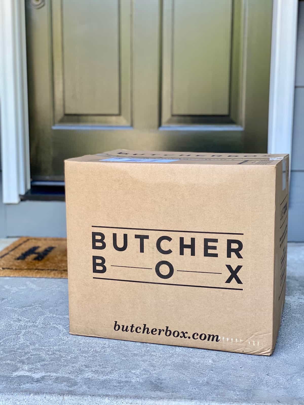 Large ButcherBox delivered on a porch.