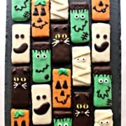 Decorated graham cracker cookies to look like frankenstein and ghosts.