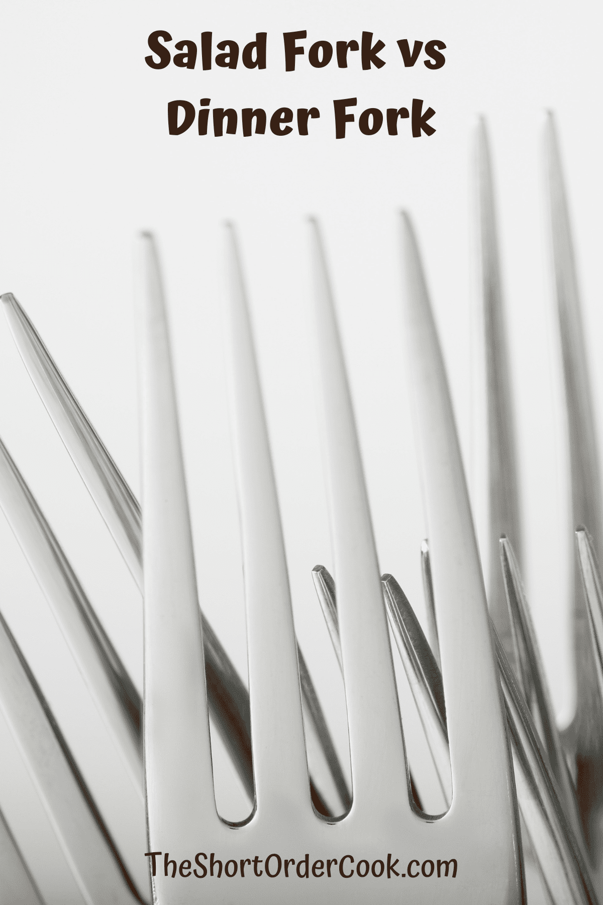 Several forks with a white background.