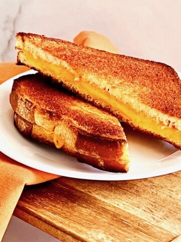 Toasted grilled cheese sandwich plated.