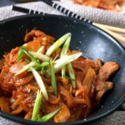 Kimchi stew made with strips of steak and spicy kimchi.