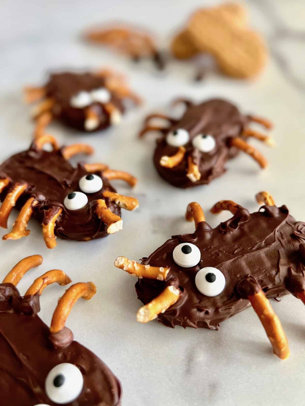 Bug & Spider Peanut Butter Chocolate Cookies look like they are crawling on the counter.