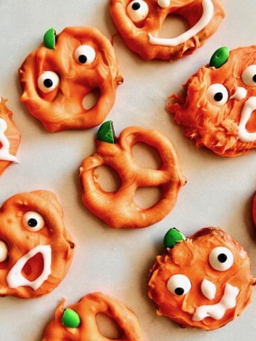 Pumpkin Pretzels Faces & pretzels ready to eat close up.