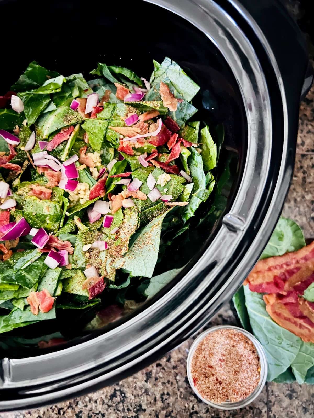 Collard Greens OVerhead of ingredients in the crockpot.