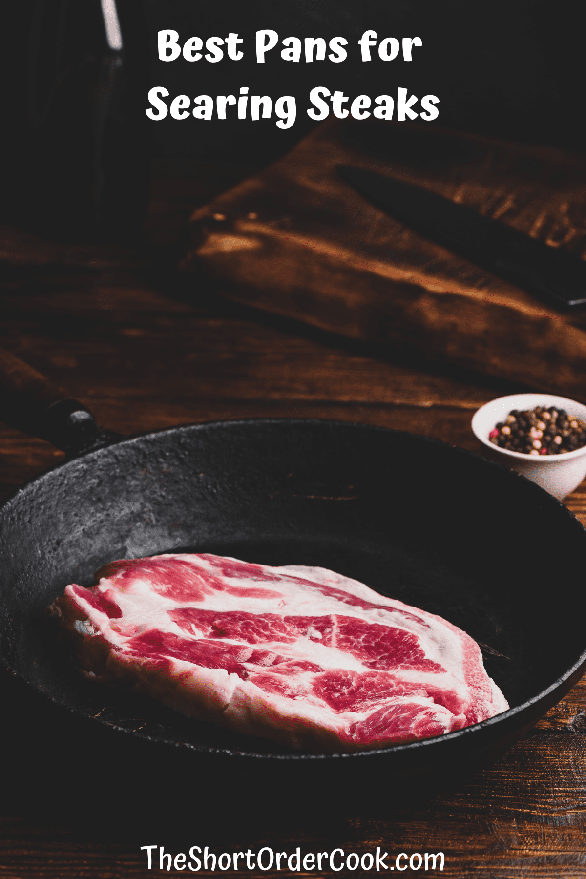 A raw steak in a cast iron skillet.