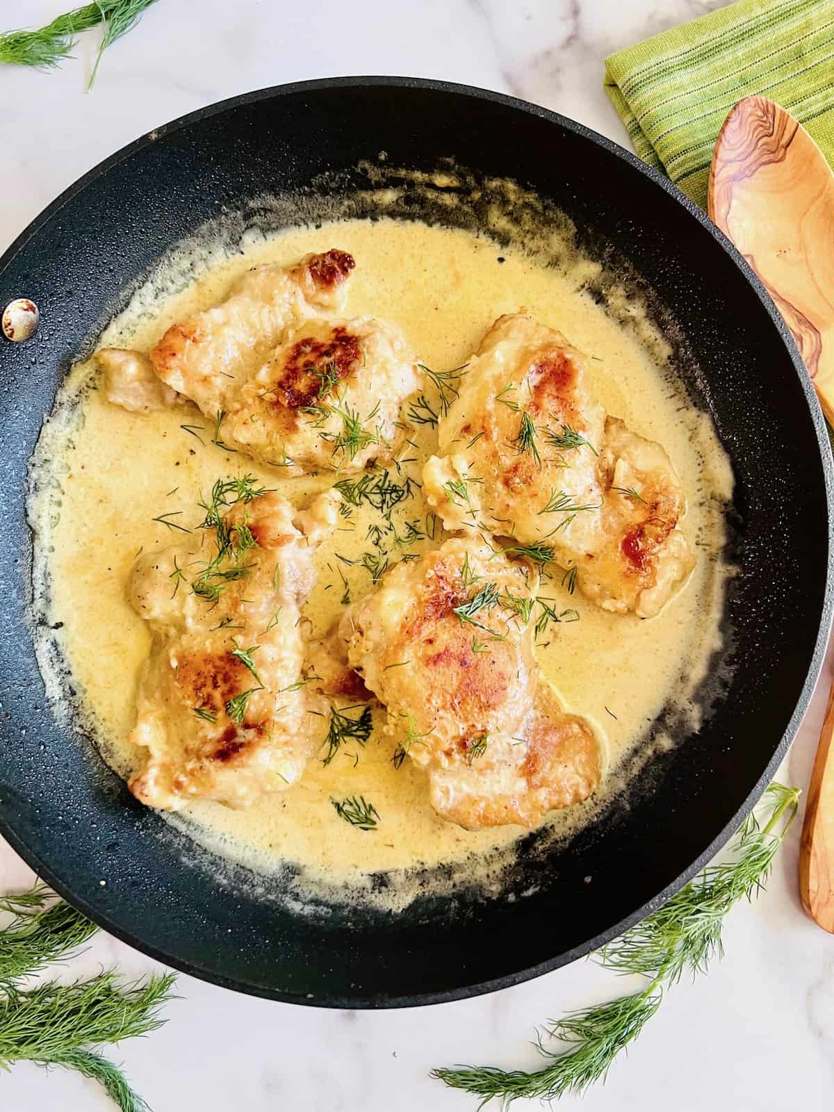Creamy Lemon Dill Butter Chicken Overhead skillet ready to eat.