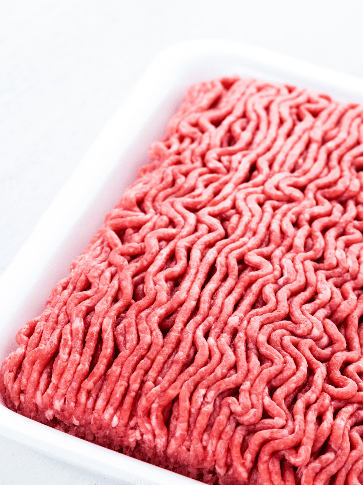 Ground beef raw in a package.