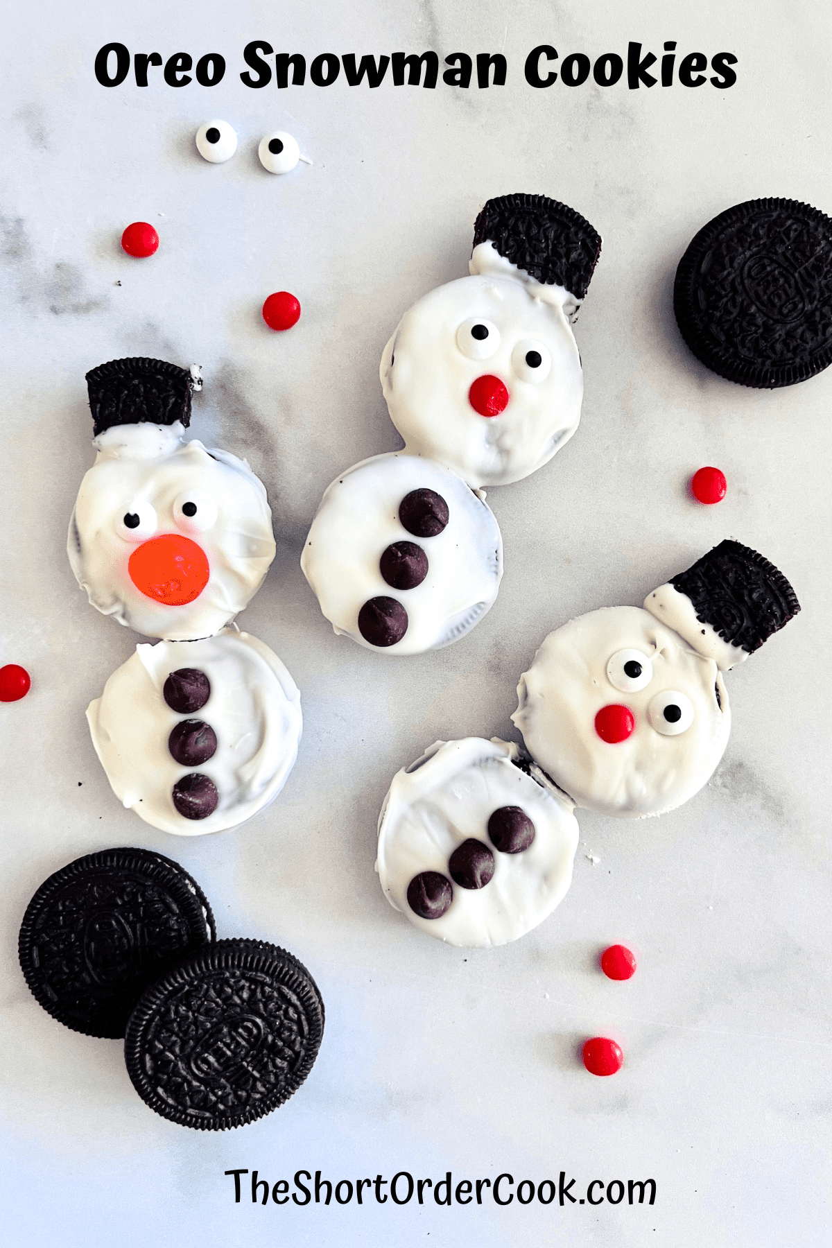 Decorated and candy dipped Oreo that look like snowmen. 