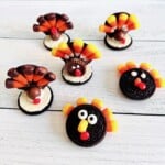 6 different Oreo cookies decorated like 3 different style Thanksgiving turkeys.