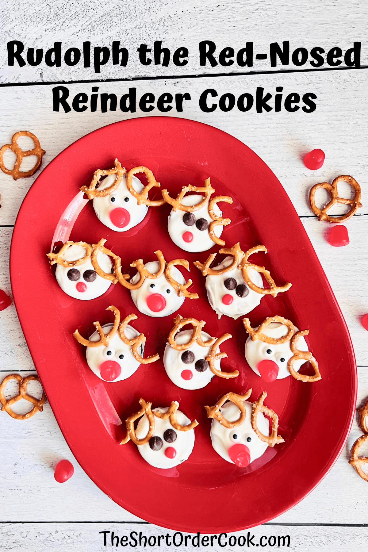 Rudolph the Red-Nosed Reindeer Cookies on a red holiday platter.