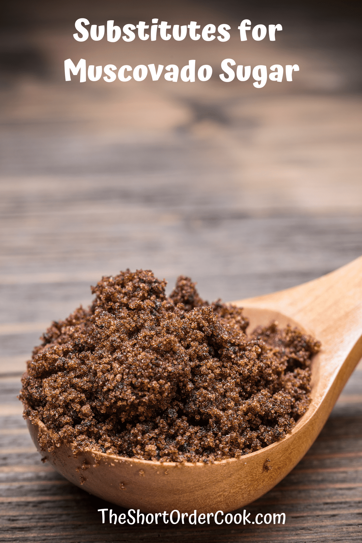 A wooden scoop full of muscovado sugar.