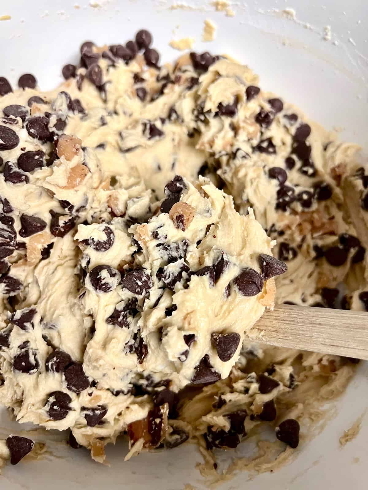 Sea Salt Toffee Chocolate Chip Cookies Folding semisweet chocolate chips and toffee pieces into cookie dough.