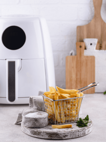 Best Air Fryer for a Family of 4 Air fryer and fries on a counter.