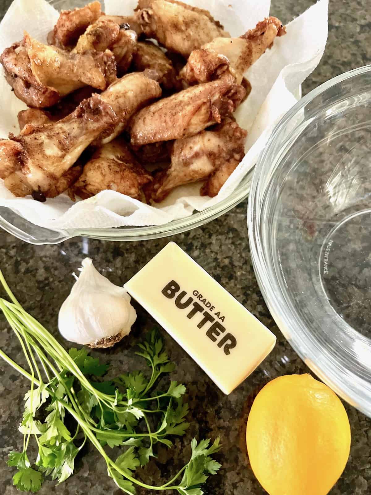 Garlic Butter Wings Deep fried wings ready to mix with sauce.