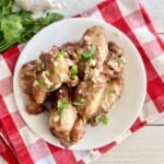 Garlic Butter Wings Plated and topped with fresh parsley.