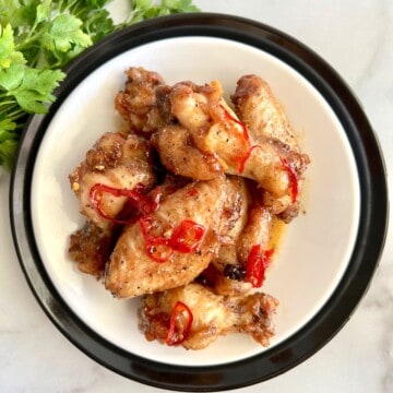 hot and spicy wings on a plate.