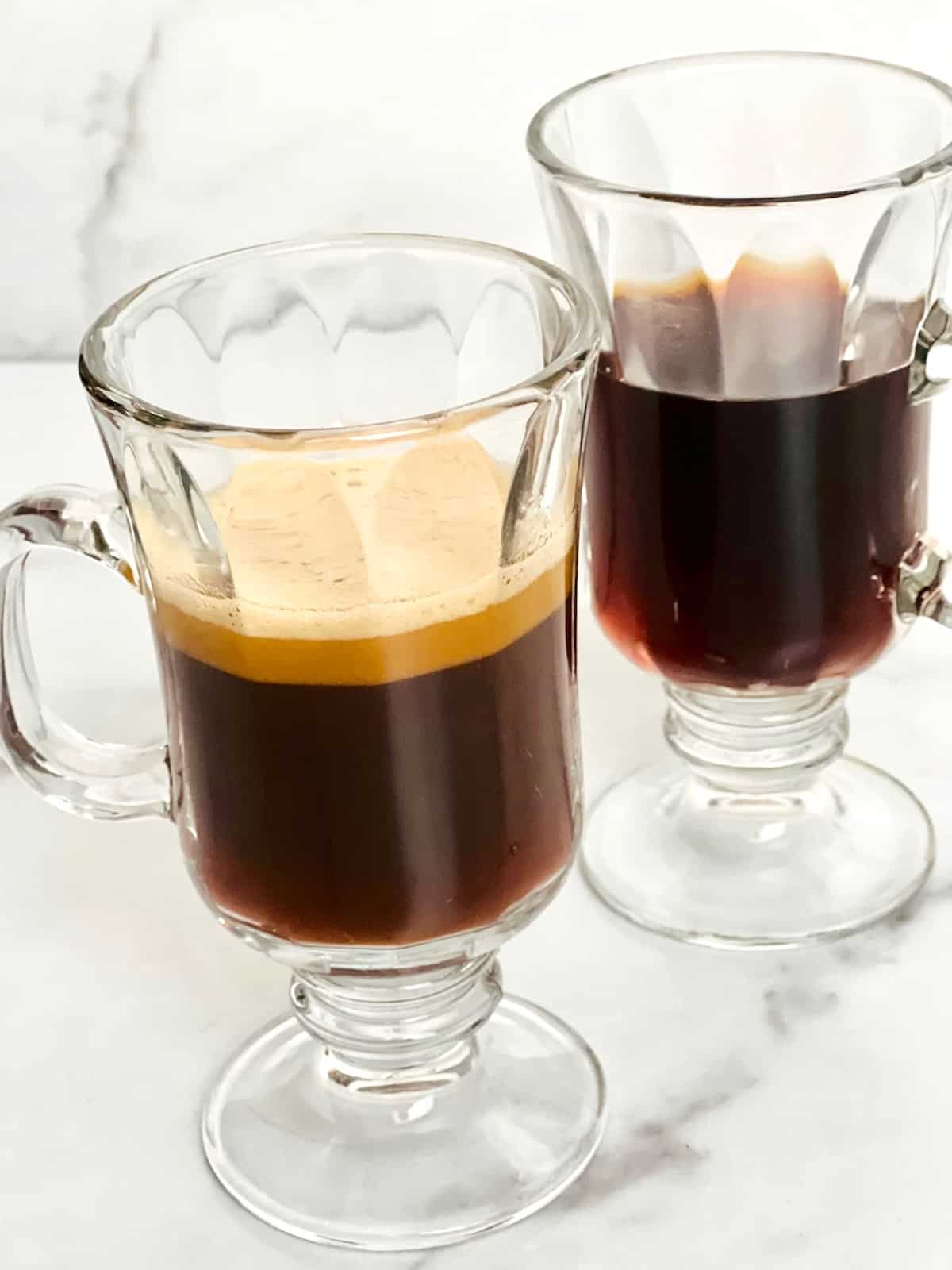 https://theshortordercook.com/wp-content/uploads/2023/02/Coffee-with-Olive-Oil-Oleato-Two-cups-one-with-olive-oil-foam-side-by-side.jpg