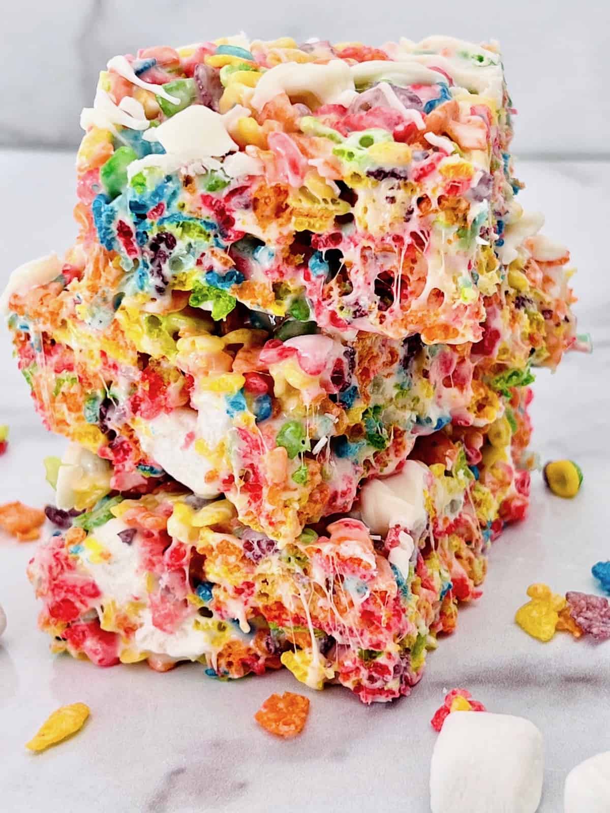 Fruity Pebbles Cereal Bars 3 stacked up closeup.