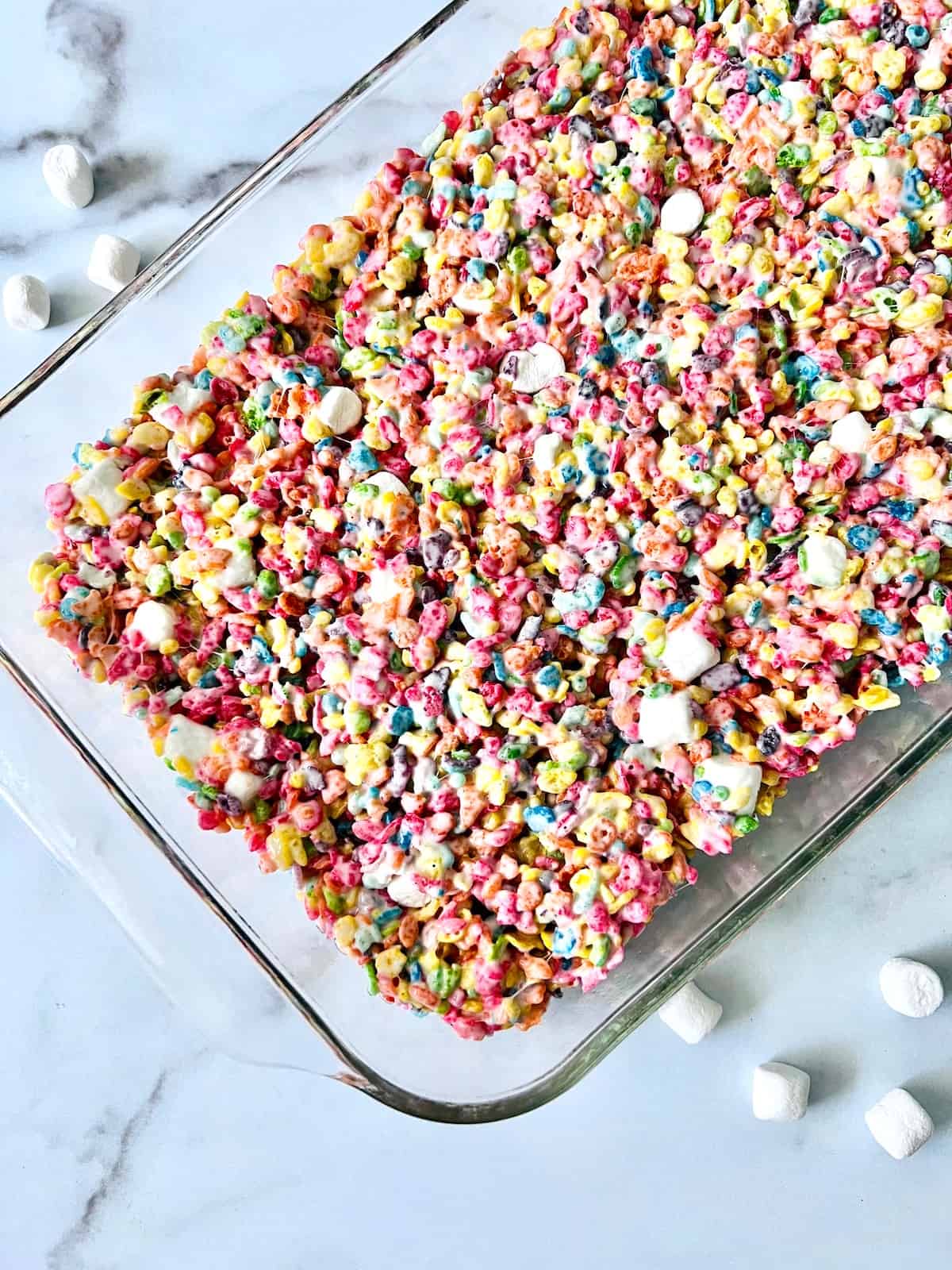Fruity Pebbles Cereal Bars cooling in the baking dish.