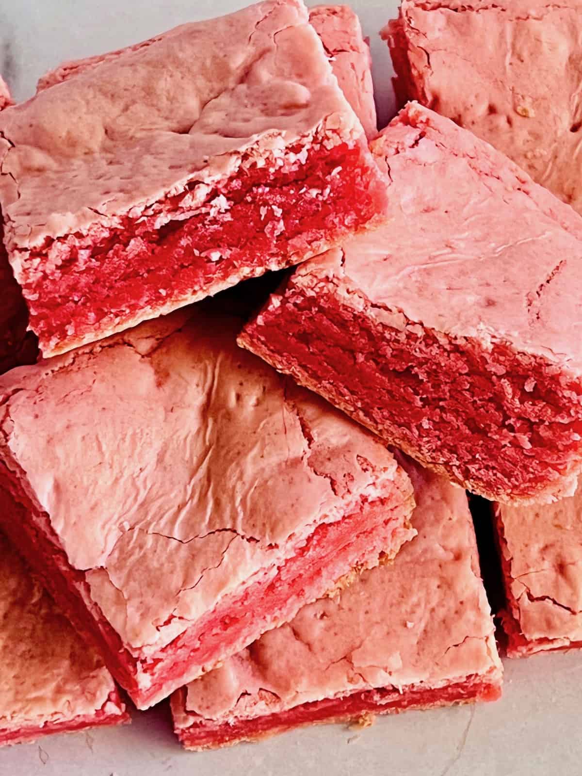 Strawberry Brownies Stacked up ready to eat.