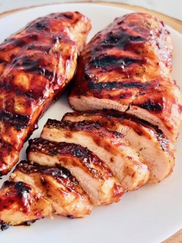 Grilled BBQ Chicken Breasts sliced and ready to serve.