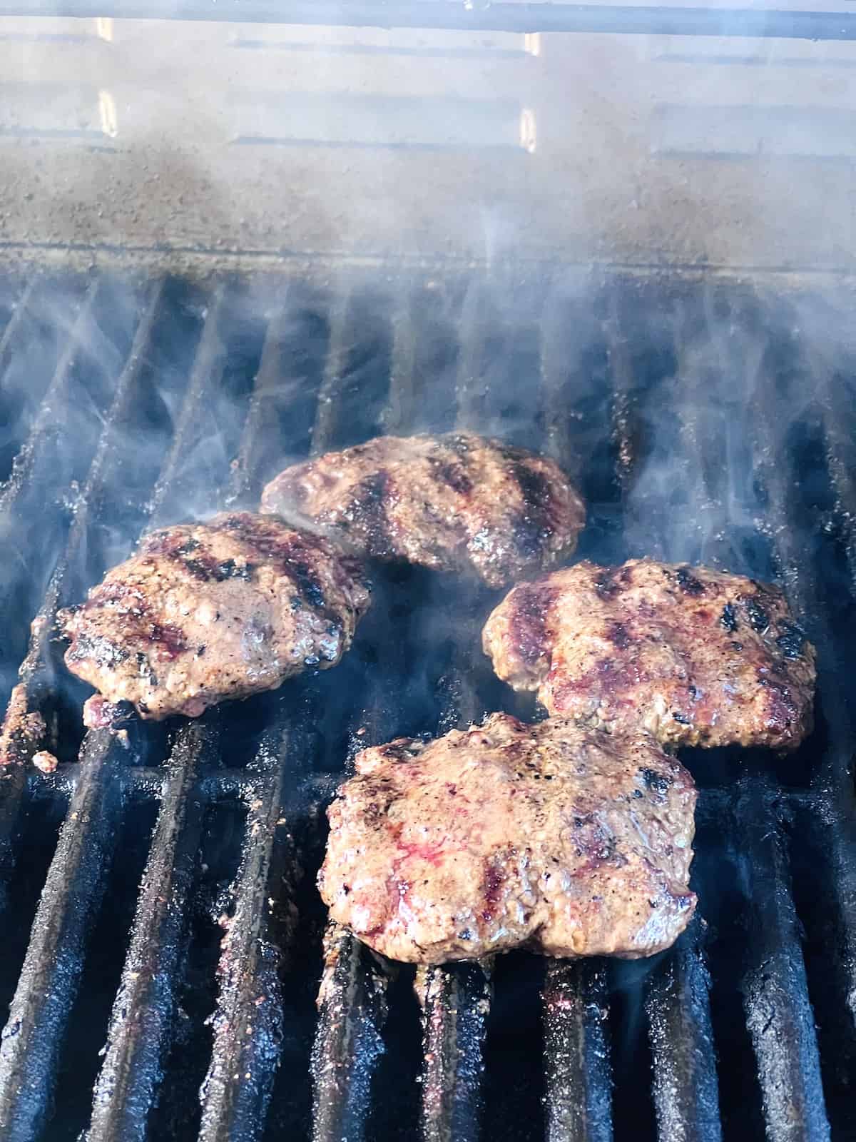 Wagyu patties of beef on the grill