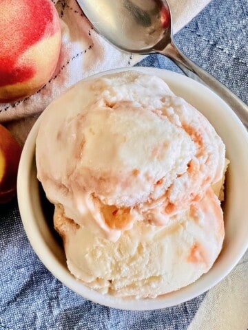 Bowl of Homemade Peaches & Cream Ice Cream ready to eat.