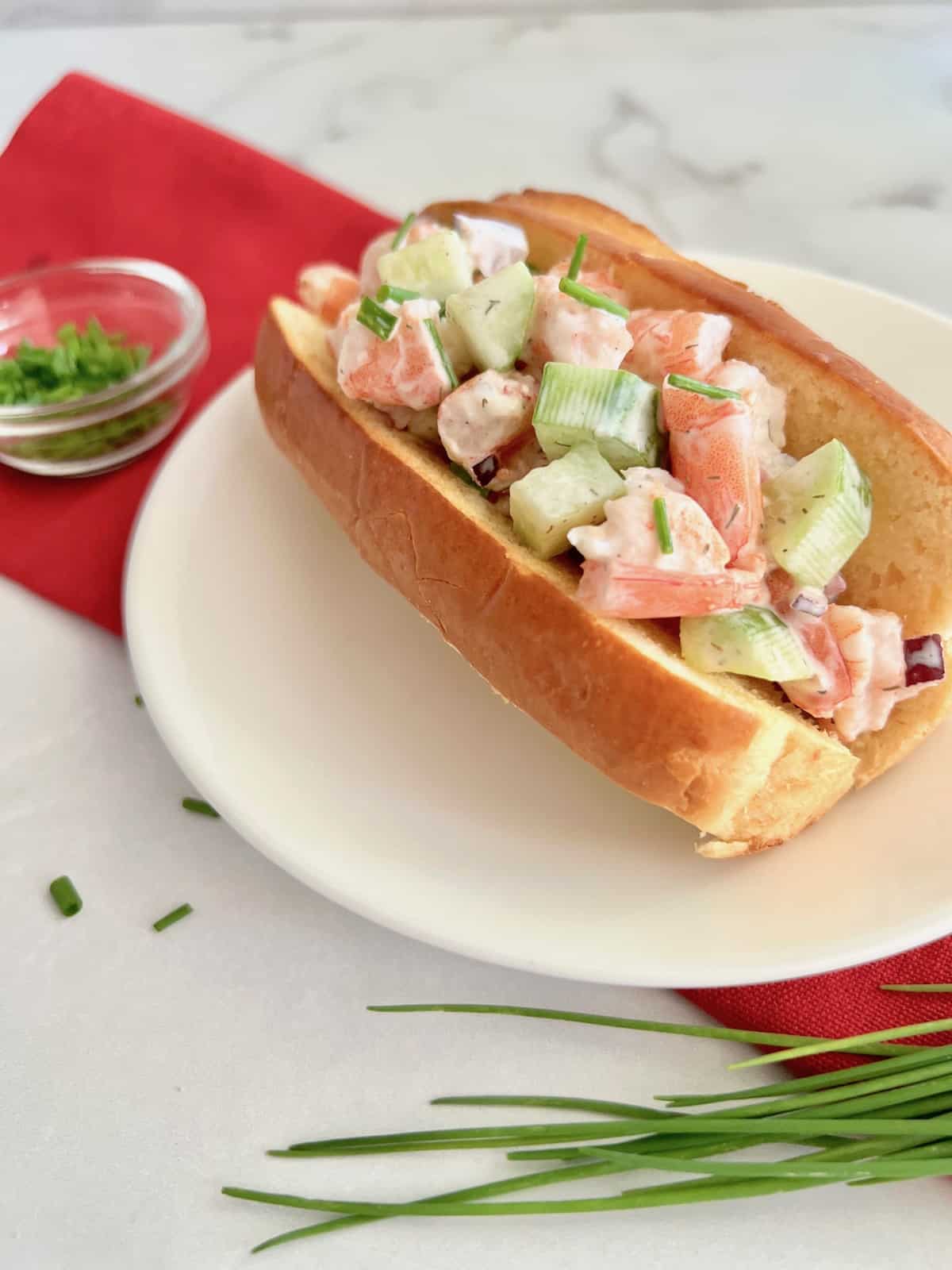 Low cost alternative shrimp salad used as a Poor Man's Lobster roll filling in a bun. 