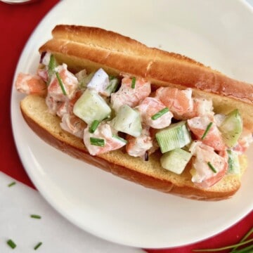 An inexpensive poor man's Maine lobster roll made with shrimp & chive mayo dressing in a brioche bun.
