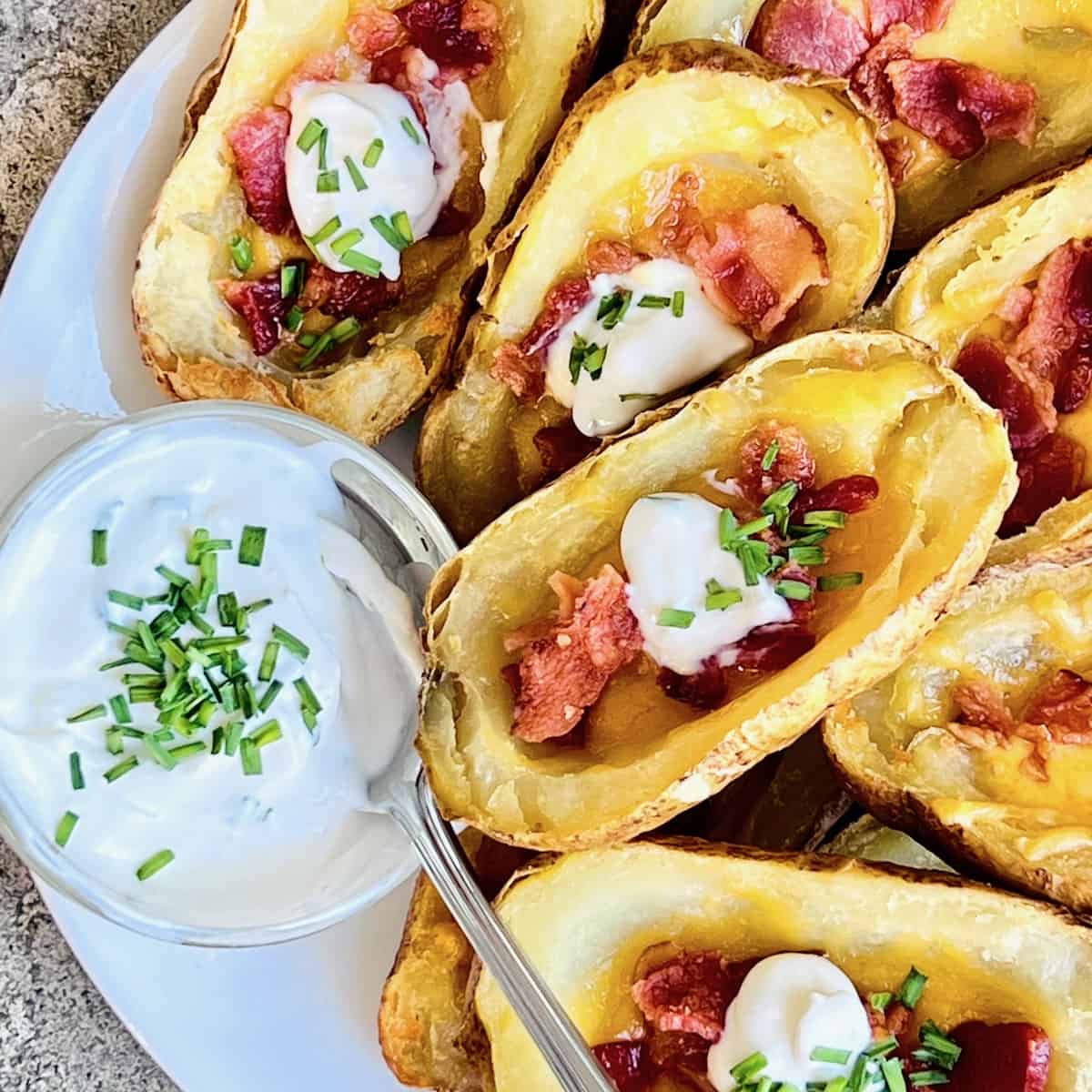 Homemade Potato skins made with air fryer baked russet potatoes.