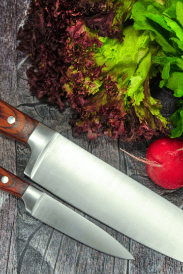 A best buy for cutting vegetables, a chef and paring knife on a cutting board.