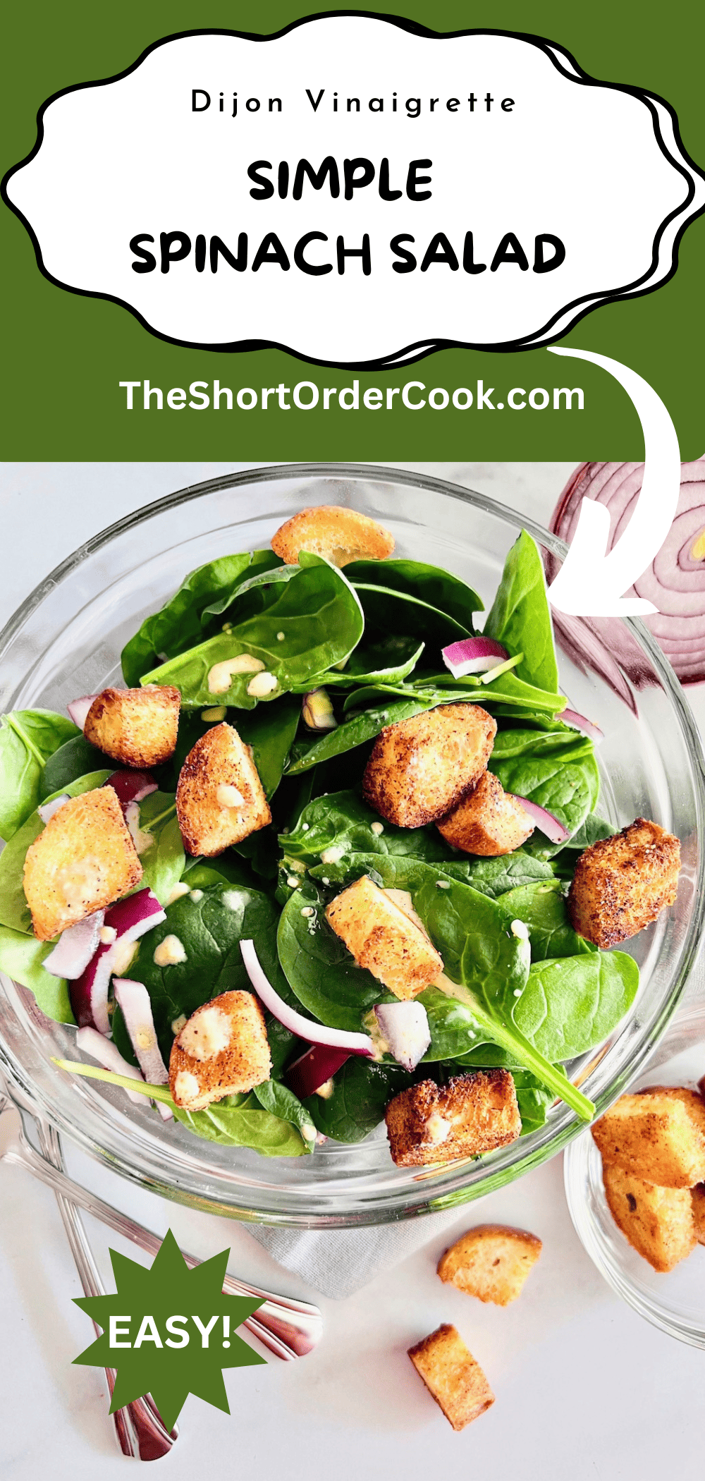Simple salad of baby spinach, croutons, & onion with a mustard dressing.