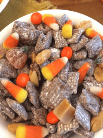 Halloween Muddy Buddies (puppy chow) in a bowl.