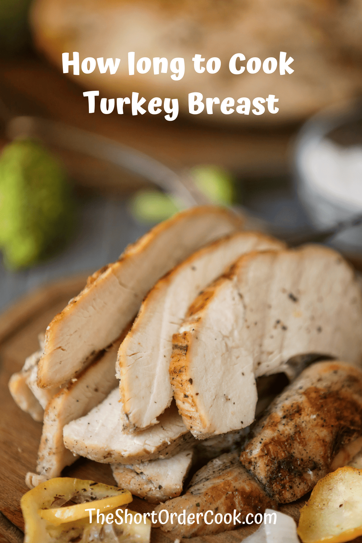 Turkey breast sliced on a cutting board.