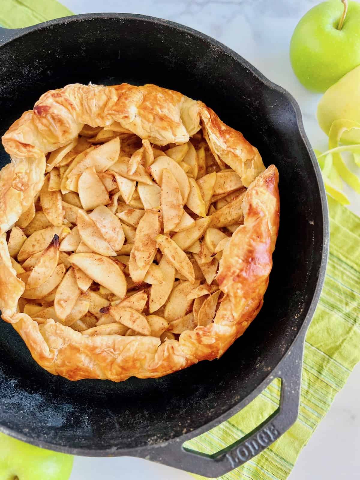 Puff Pastry Apple Galette In a cast iron skillet without any toppings.