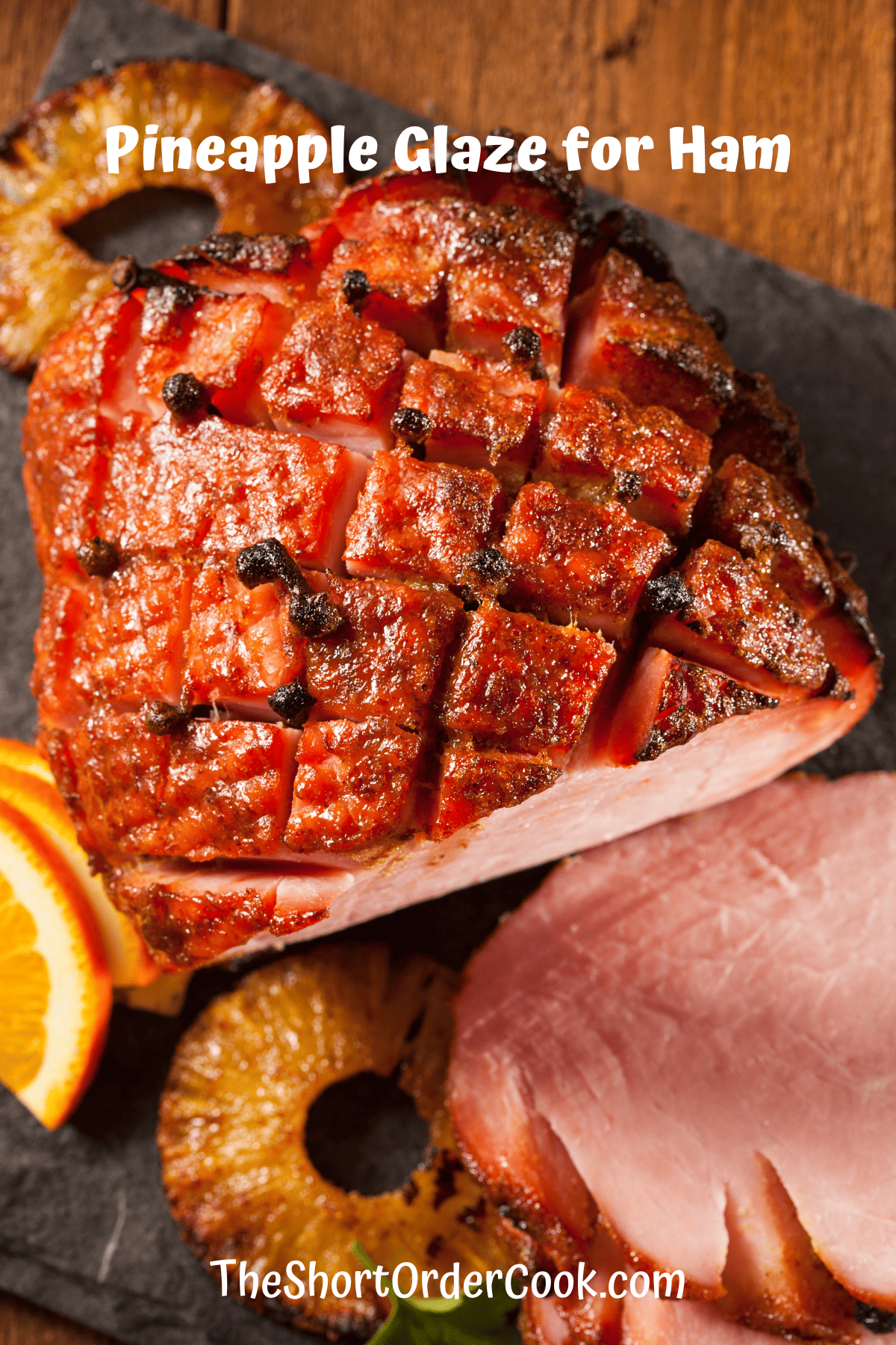 Whole ham topped with a pineapple glaze and cloves.