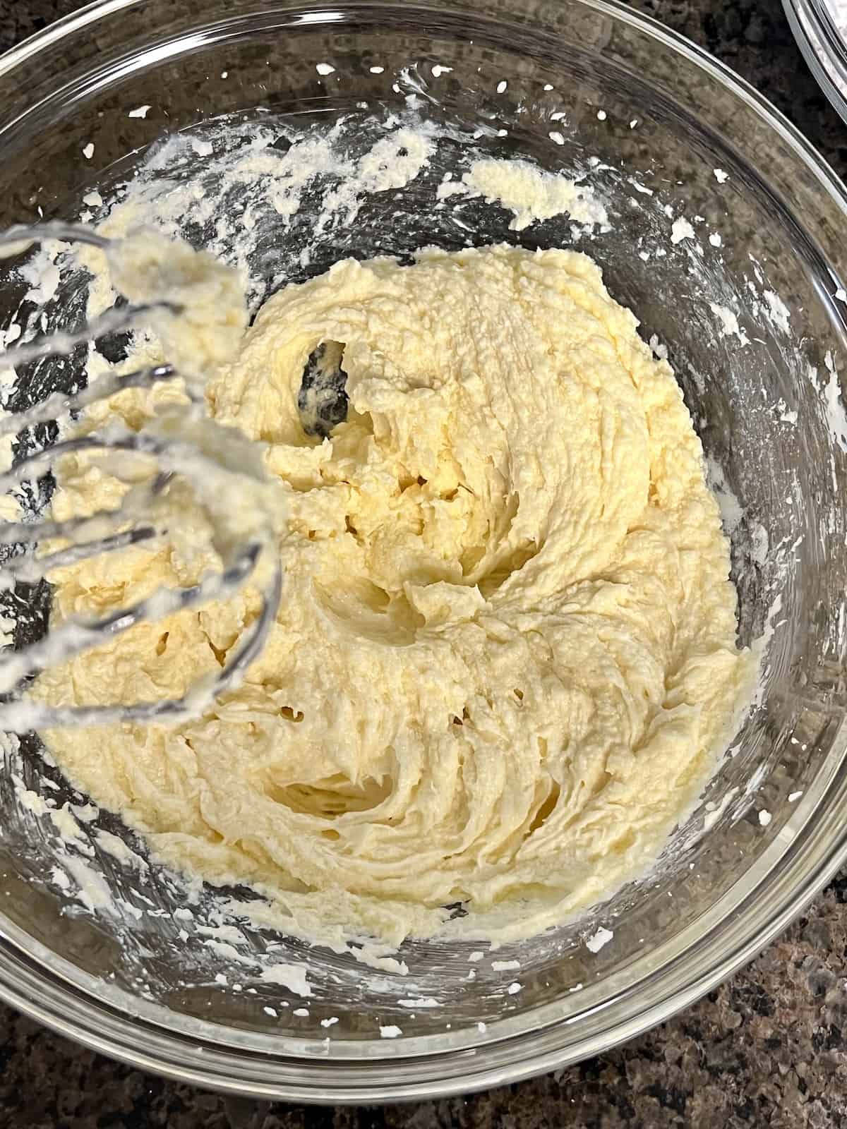 Creamed butter and sugar in a bowl.