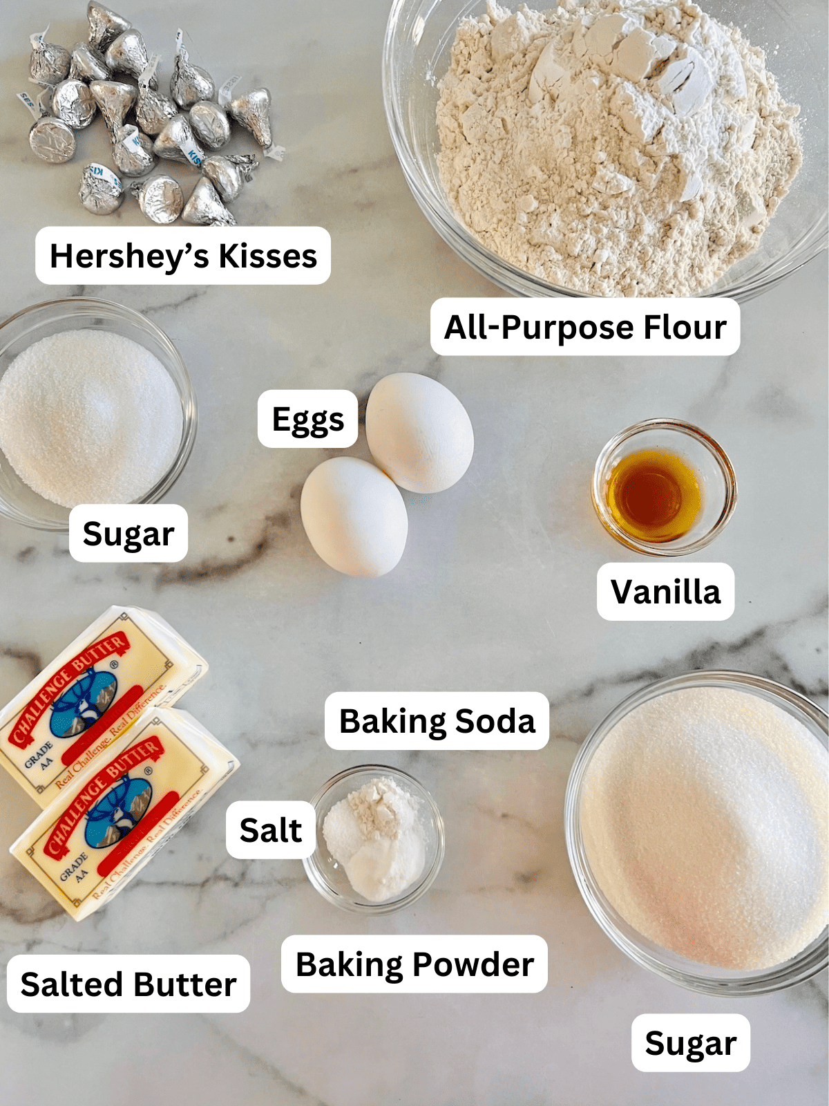 Ingredients on the counter to make sugar cookies with hershey kisses.