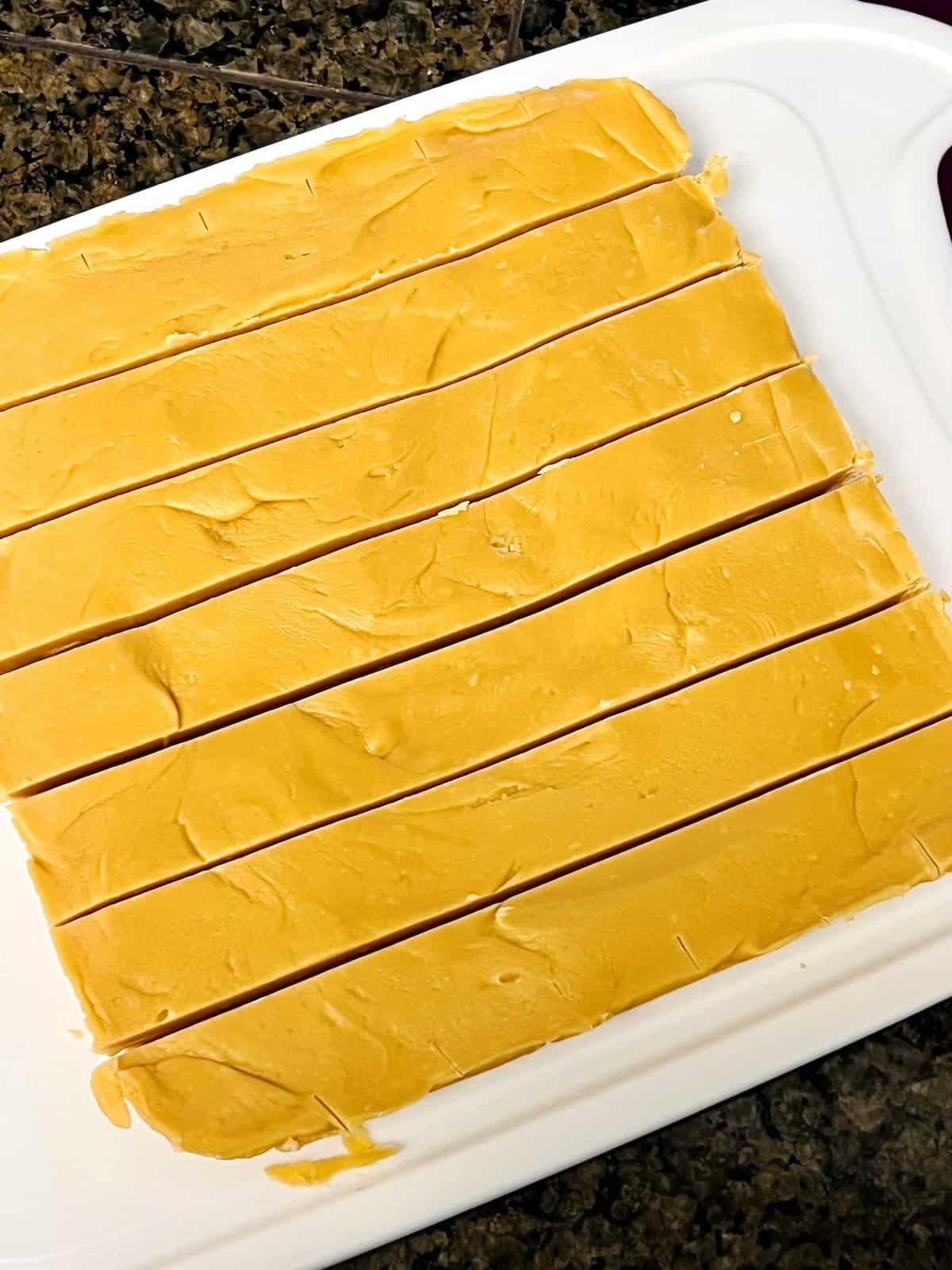 Butterscotch Fudge Cut into horizontal even strips 1 inch wide.