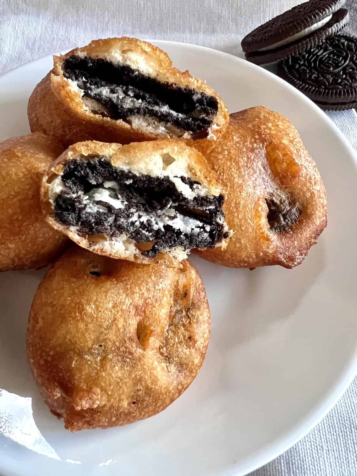 Deep Fried Oreos best recipe fresh made piled on a plate.